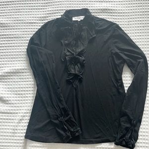 Black blouse with an extra material cut, long sleeves with details